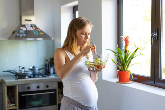 Focused expectant mother excited with organic lunch